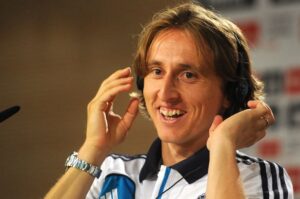 Luka+Modric+gives+a+press+conference+during+his+official+presentation+at+the+Bernabeu+stadium+in+Madrid