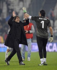22621-antonio-conte-e-gigi-buffon-dopo-il-4-0-rifilato-alludinese