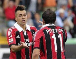 AC Milan's Stephan El Shaarawy celebrates with his teammate Giampaolo Pazzini after scoring against Udinese during their Serie A soccer match at Friuli stadium in Udine