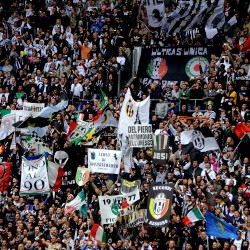 Juventus' supporters cheer their team du