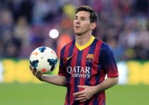 Lionel-Messi-with-the-match-ball-after-his-hat-trick-in-the-7-0-win-against-Osasuna