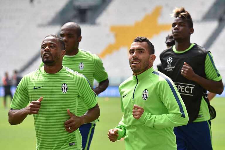 Evra e Tevez